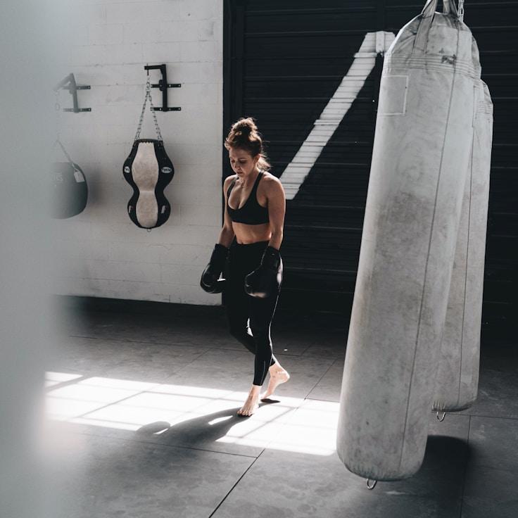 Interior of a professional gym with weight training equipment and mirrors